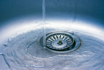 water going down sink drain