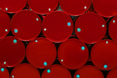 large red containers of toxic waste
