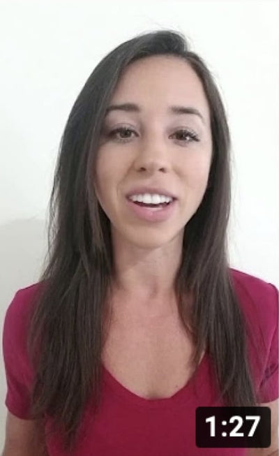 Woman in red talking for video